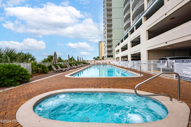 view of swimming pool featuring a patio