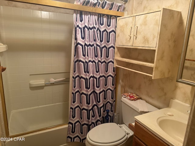 full bathroom with shower / tub combo with curtain, vanity, and toilet