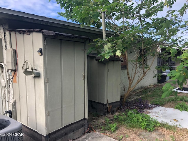 view of outbuilding featuring cooling unit