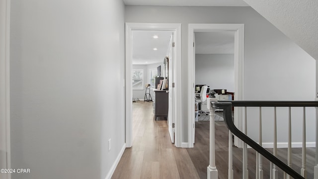 hall featuring light wood-type flooring