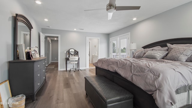 bedroom featuring ceiling fan, ensuite bath, and hardwood / wood-style floors