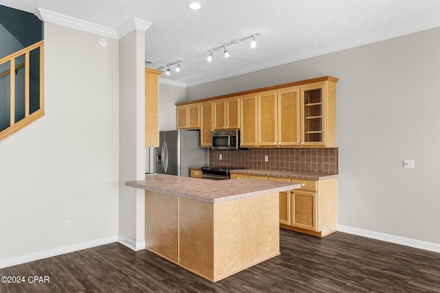 kitchen featuring kitchen peninsula, appliances with stainless steel finishes, dark hardwood / wood-style floors, and crown molding