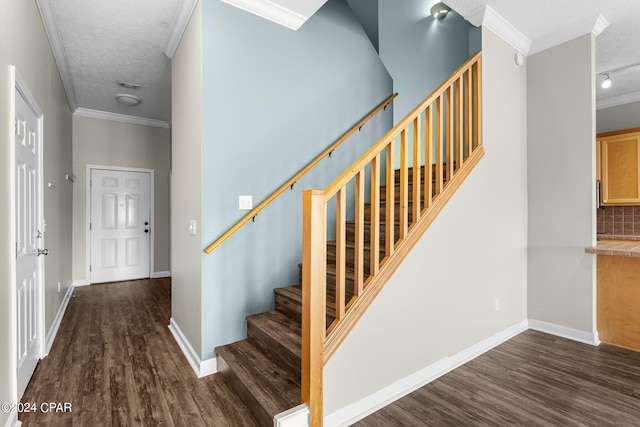 hallway with a textured ceiling and dark wood-type flooring