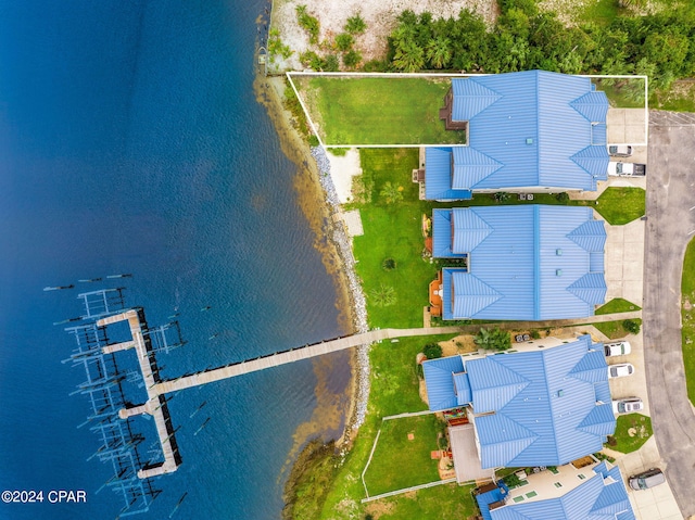 bird's eye view with a water view