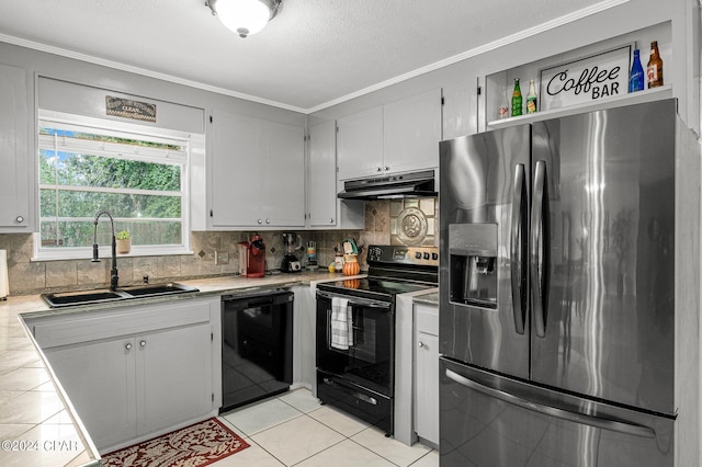 kitchen featuring black appliances, crown molding, light tile patterned flooring, and sink