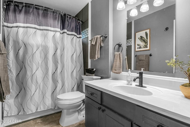 full bathroom with vanity, toilet, shower / bath combo with shower curtain, and hardwood / wood-style flooring