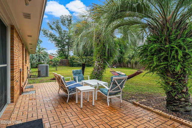 view of patio / terrace with central AC unit