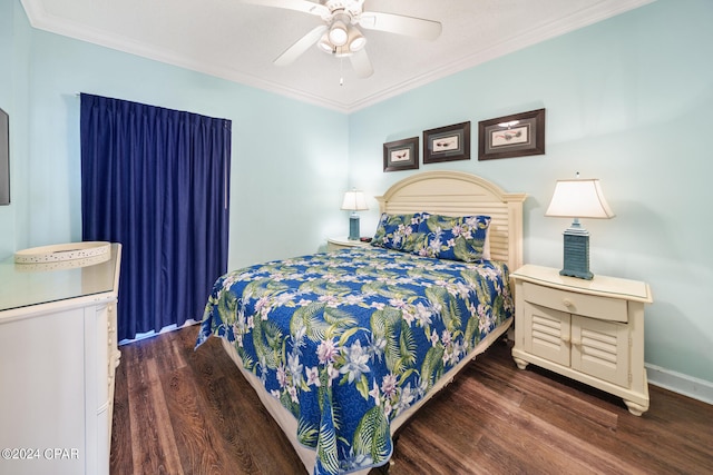 bedroom featuring ornamental molding, ceiling fan, and dark hardwood / wood-style flooring