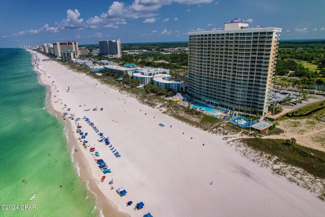 drone / aerial view with a view of the beach and a water view