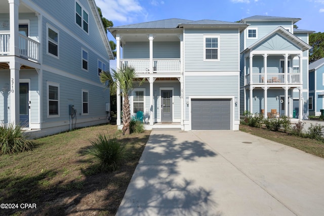 view of front of house with a balcony and a garage