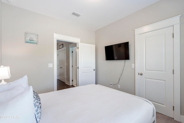 bedroom featuring carpet