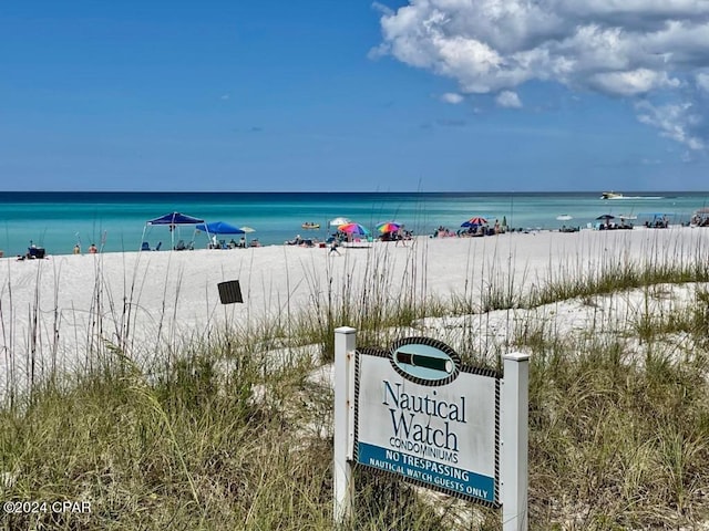 view of water feature with a beach view