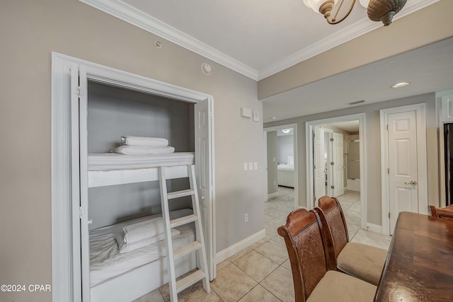 interior space featuring ornamental molding and light tile patterned flooring