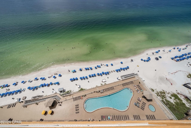 aerial view featuring a water view and a beach view