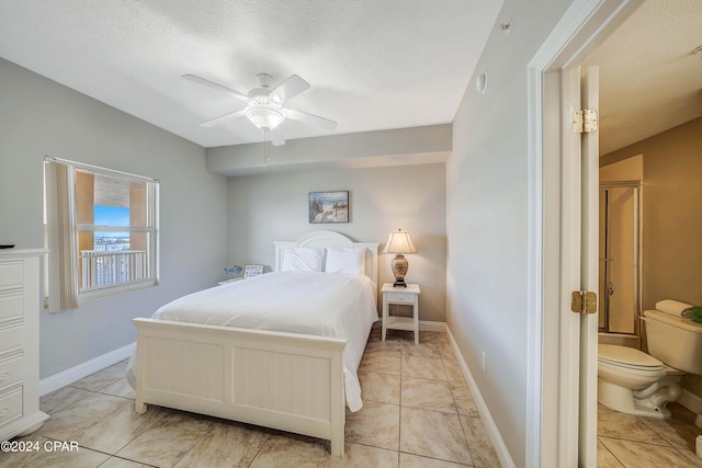 bedroom with ceiling fan, a textured ceiling, and light tile patterned floors