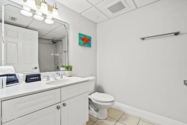 full bath featuring visible vents, a paneled ceiling, walk in shower, and tile patterned flooring