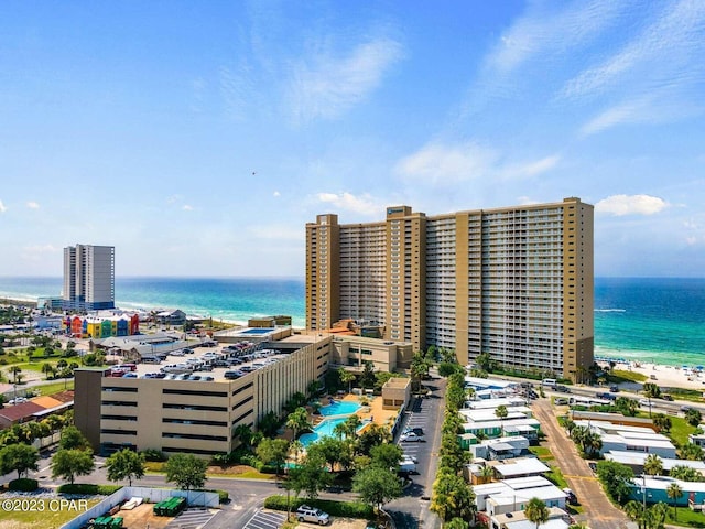 bird's eye view featuring a water view and a city view