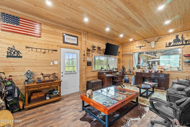 living room featuring wood ceiling, wood walls, and hardwood / wood-style floors