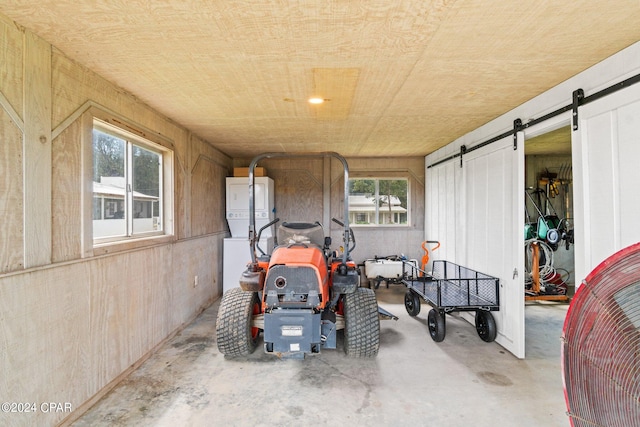 view of patio with stacked washer / drying machine