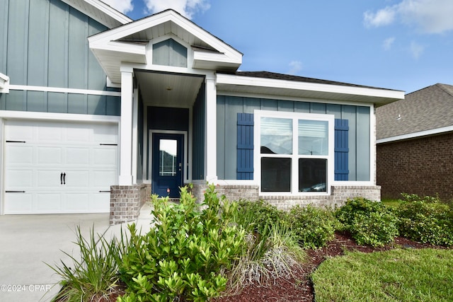 property entrance with a garage