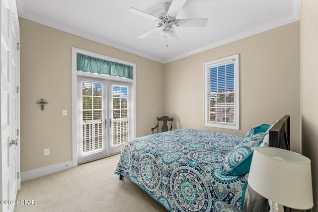 carpeted bedroom with ceiling fan, access to exterior, and crown molding