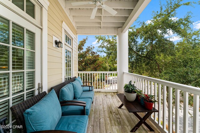 balcony featuring outdoor lounge area and ceiling fan