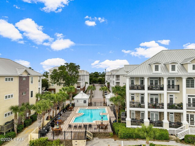 view of pool featuring a patio