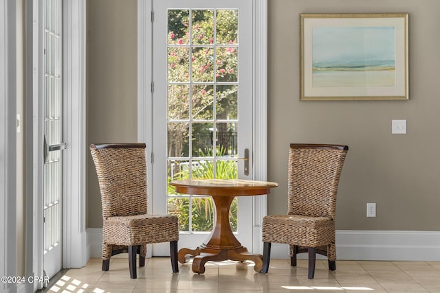 sitting room with light tile patterned floors