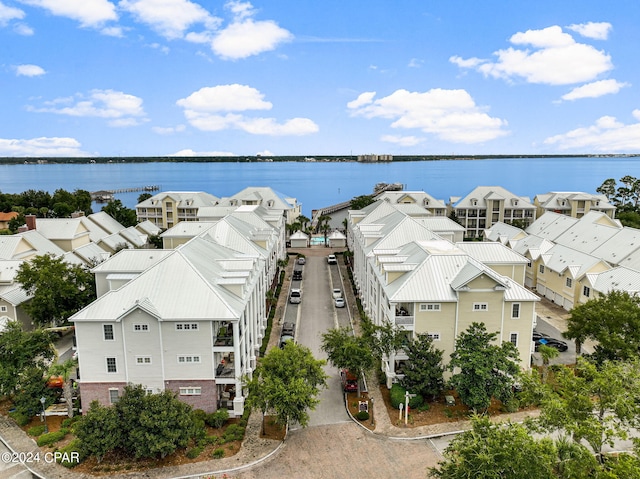 bird's eye view with a water view and a residential view