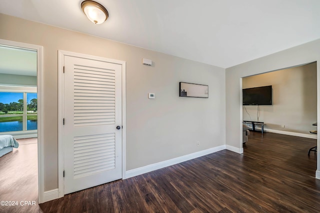 interior space with dark wood-type flooring