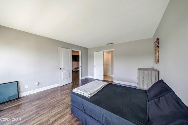 bedroom featuring hardwood / wood-style flooring