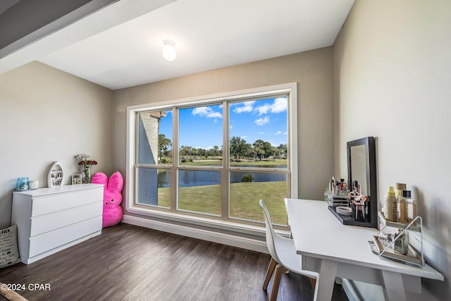 office area with a water view and dark hardwood / wood-style flooring