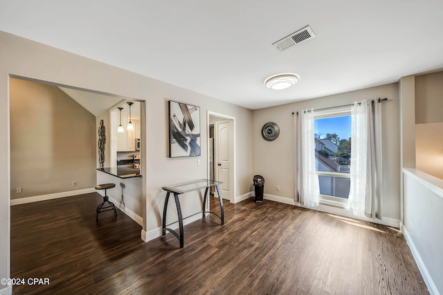 interior space with dark hardwood / wood-style floors