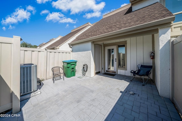 view of patio / terrace featuring central AC and french doors