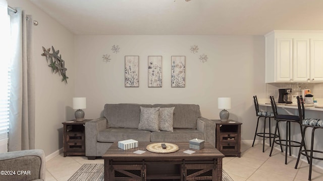 living room featuring light tile patterned floors