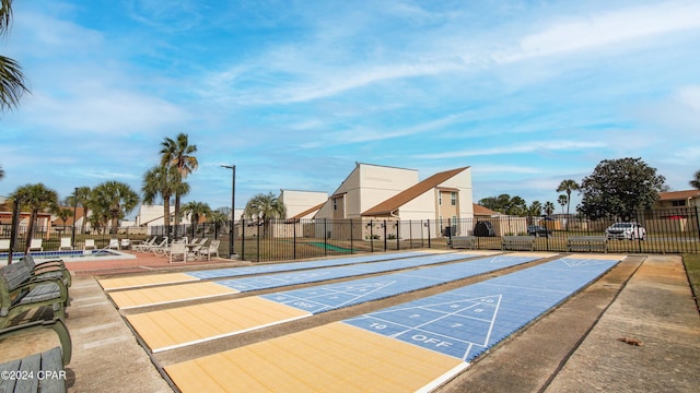 view of property's community featuring a swimming pool