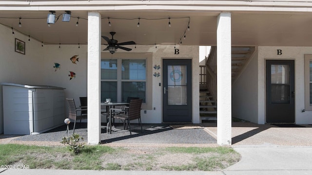 doorway to property featuring ceiling fan and a patio