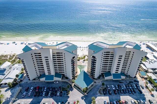 drone / aerial view with a view of the beach and a water view