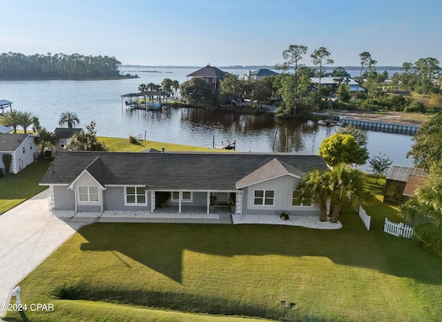 exterior space featuring a water view and a front yard