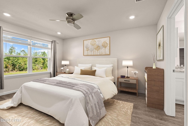 bedroom featuring ceiling fan and hardwood / wood-style floors