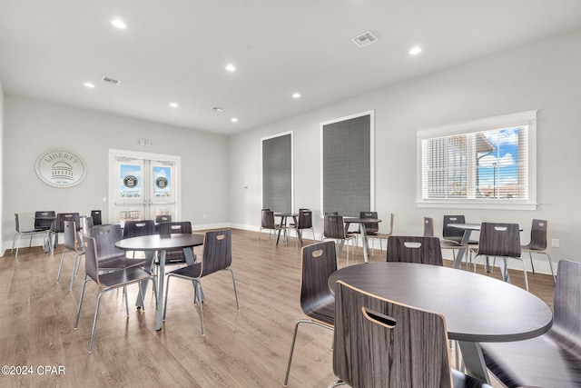 dining area with light wood-type flooring