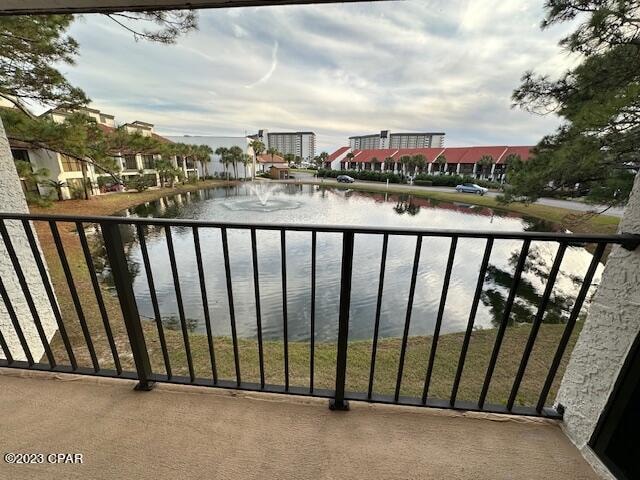 balcony featuring a water view