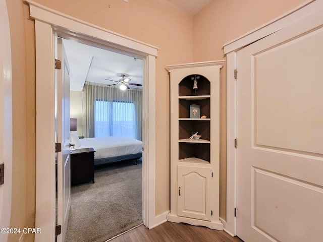 corridor featuring hardwood / wood-style flooring