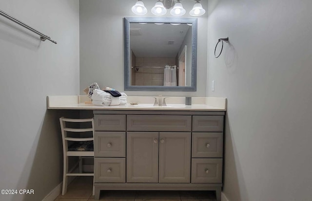 bathroom featuring tile patterned floors, vanity, and a shower with shower curtain