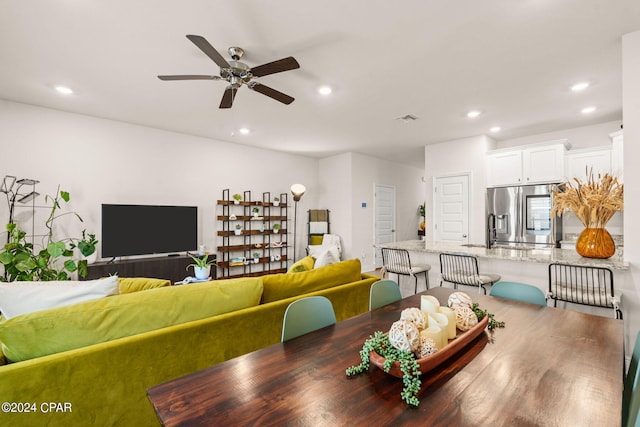 dining area with ceiling fan