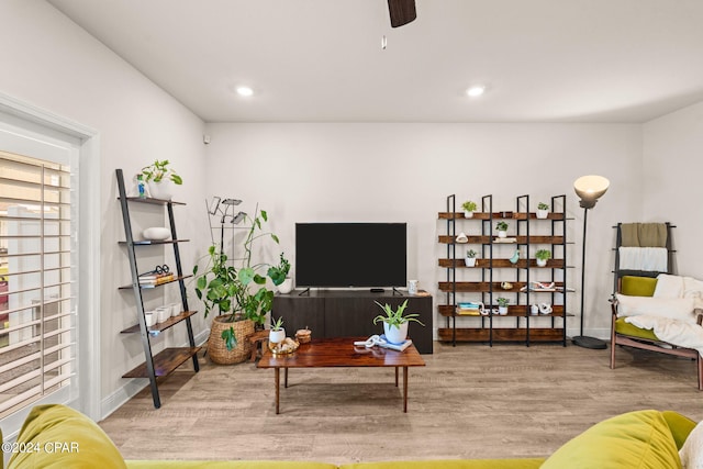 interior space with light hardwood / wood-style flooring and ceiling fan