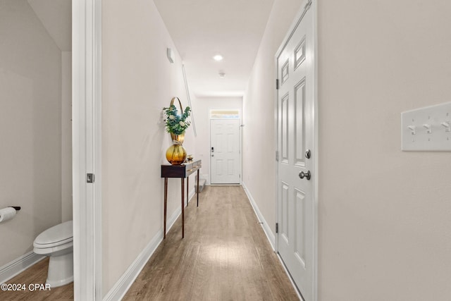 corridor featuring light hardwood / wood-style flooring