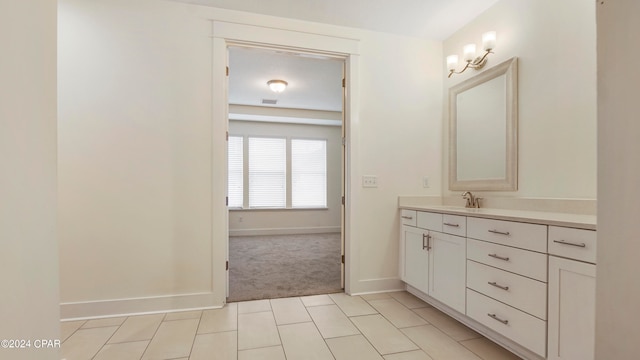 bathroom with vanity and tile patterned floors