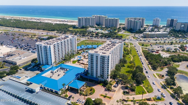 aerial view with a water view and a view of the beach