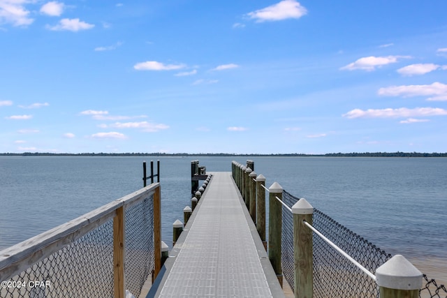 view of dock with a water view